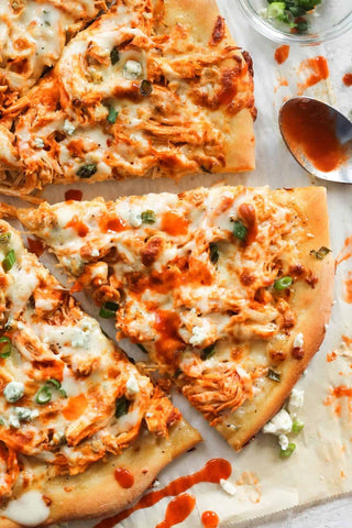 Thursday (5/9): Buffalo Chicken Pizza (our famous Paleo crust) with Spring Lettuce & Cherry Tomato Salad + Ranch Dressing (2 sauce cups per serving for your pizza & salad!) (Gluten-Free)