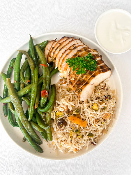Grilled Moroccan Chicken with Yogurt Sauce, Basmati Rice Pilaf with Dried Apricots & Pistachios, and Roasted Harissa Green Beans (Gluten-Free)