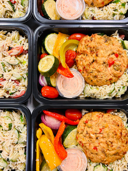 Salmon Cakes with Roasted Red Pepper Aioli, Mediterranean Orzo Salad and Summer Roasted Vegetables